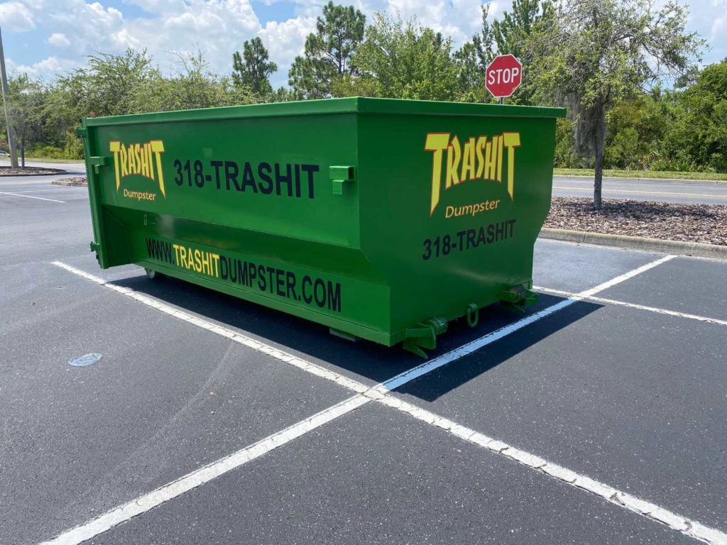 Trashit Dumpster A green dumpster in a parking lot